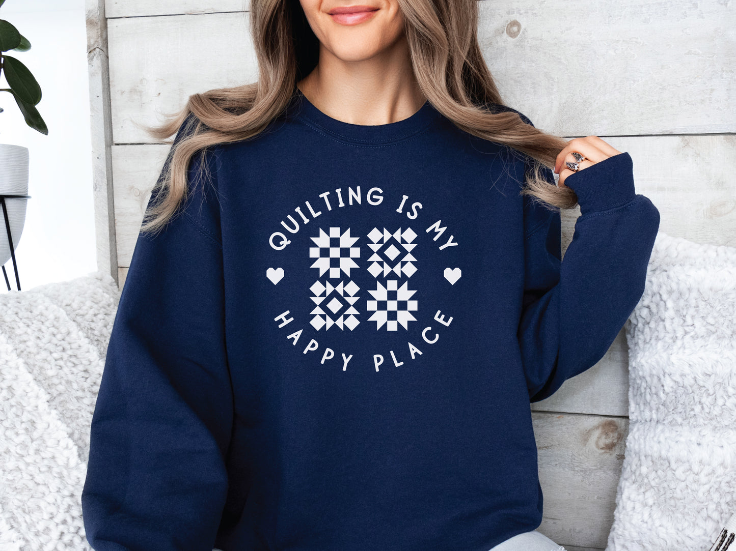 Cozy unisex sweatshirt with the phrase “Quilting Is My Happy Place” printed on the front — perfect for quilters and sewists who love to create.