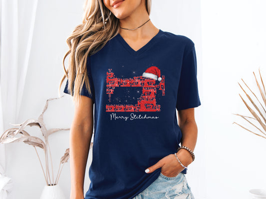 Sewing-themed Christmas design featuring a sewing-machine tree with a Santa hat and “Merry Stitchmas” text on a V-neck t-shirt — fun holiday gift for quilters and sewists.