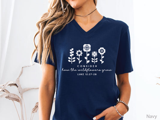 Quilt-inspired wildflower design t-shirt featuring Bible verse Luke 12:27–28, perfect for quilters and faith-based apparel.