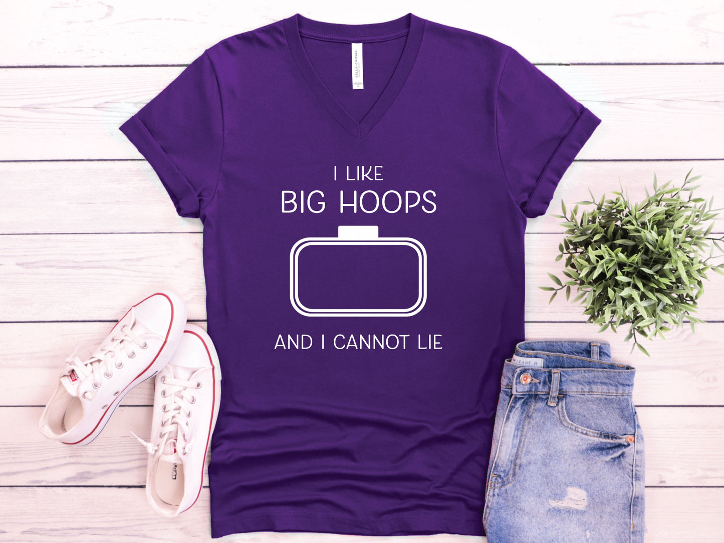 Embroidery-themed t-shirt with the phrase “I Love Big Hoops And Cannot Lie” and an embroidery hoop centered in the design for machine embroidery lovers.