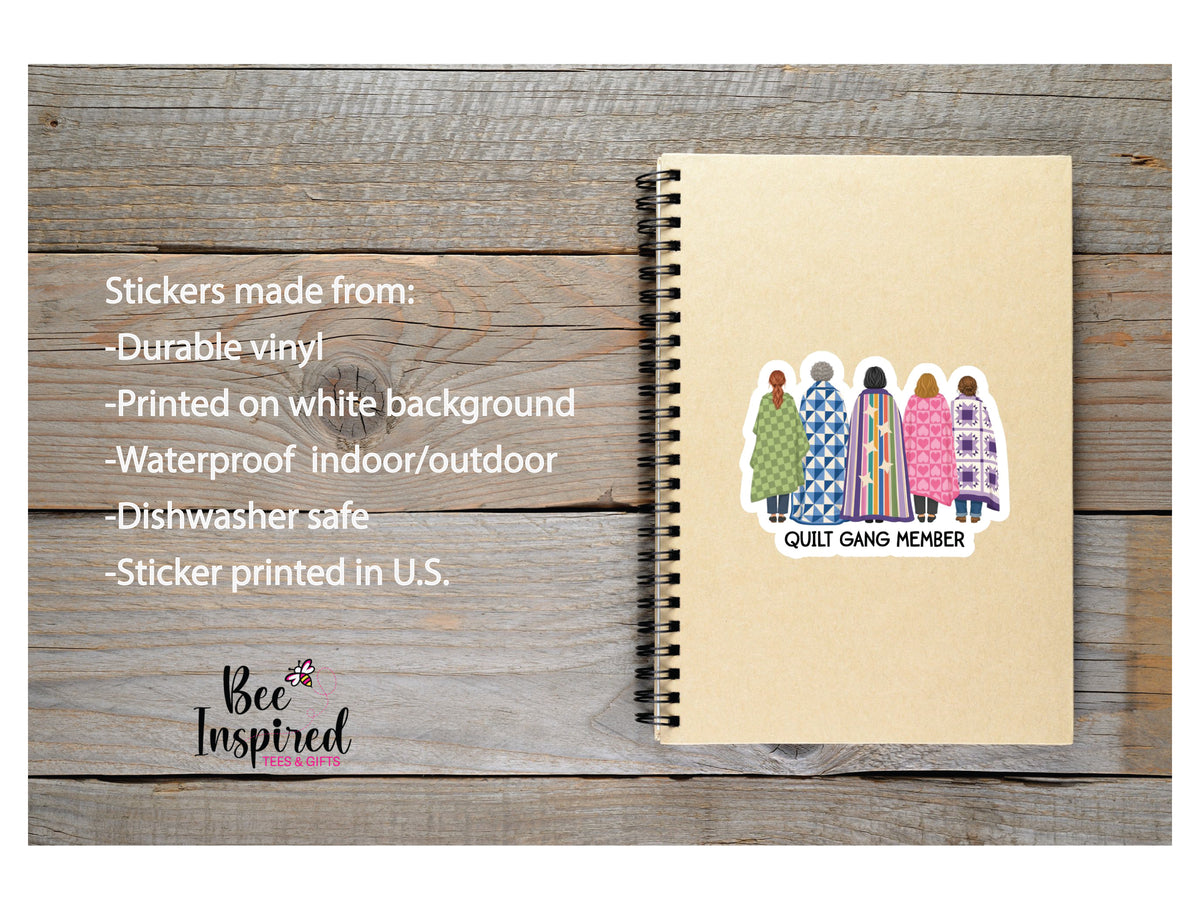 Quilt Gang Member sticker featuring five women standing together wrapped in colorful patterned quilts celebrating quilting friendship.