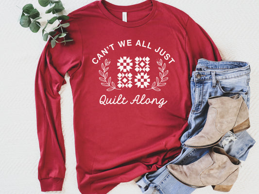 Cozy quilt-themed long sleeve Cardinal t-shirt with the phrase “Can’t We Just All Quilt Along,” perfect gift for a quilter, ideal for sewing days, quilt retreats, and craft fairs.