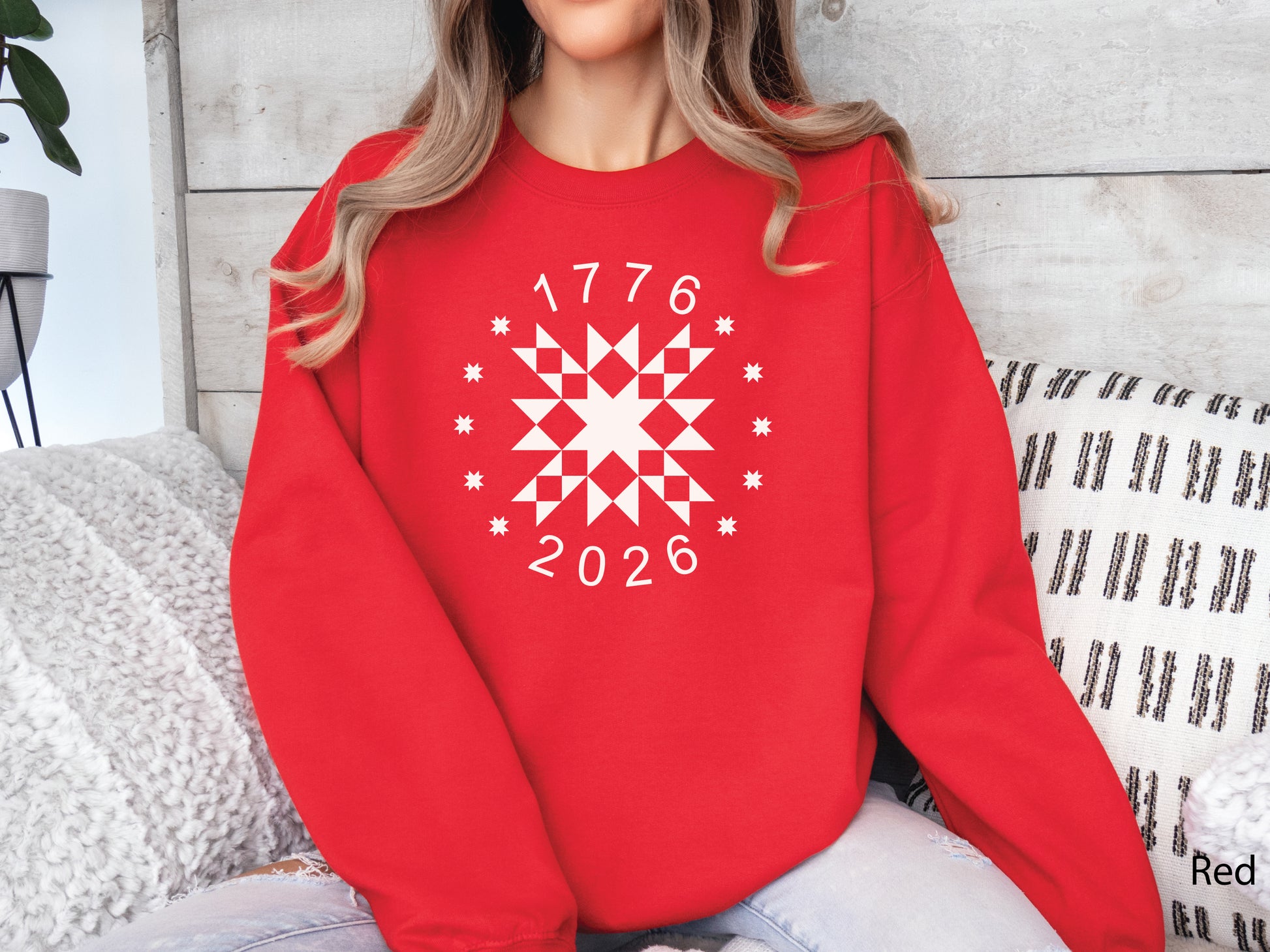 Patriotic quilting sweatshirt featuring a white star quilt block with surrounding stars and the years 1776–2026, celebrating America’s 250th Anniversary. Makes a great valor quilter gift.
