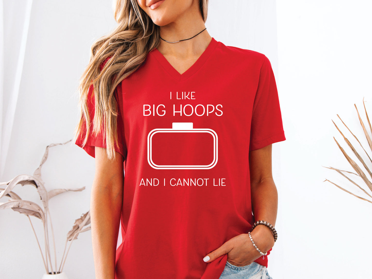 Embroidery-themed t-shirt with the phrase “I Love Big Hoops And Cannot Lie” and an embroidery hoop centered in the design for machine embroidery lovers.