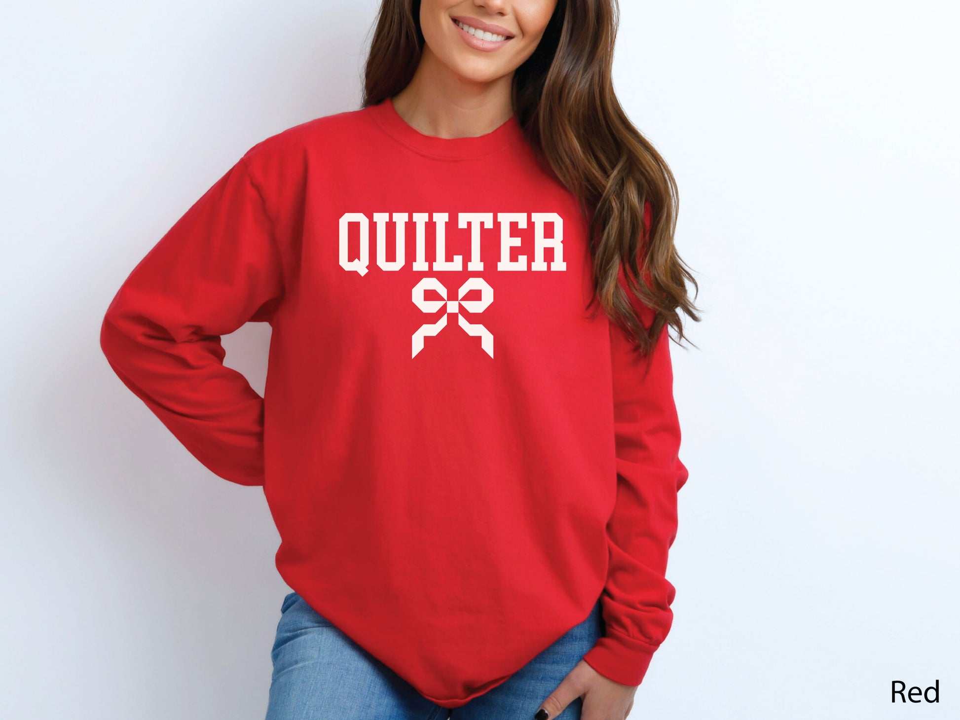 Cozy sweatshirt with bold varsity-style “Quilter” lettering and a coquette bow — perfect for quilt retreats, guild meetings, or as a thoughtful gift for quilters.