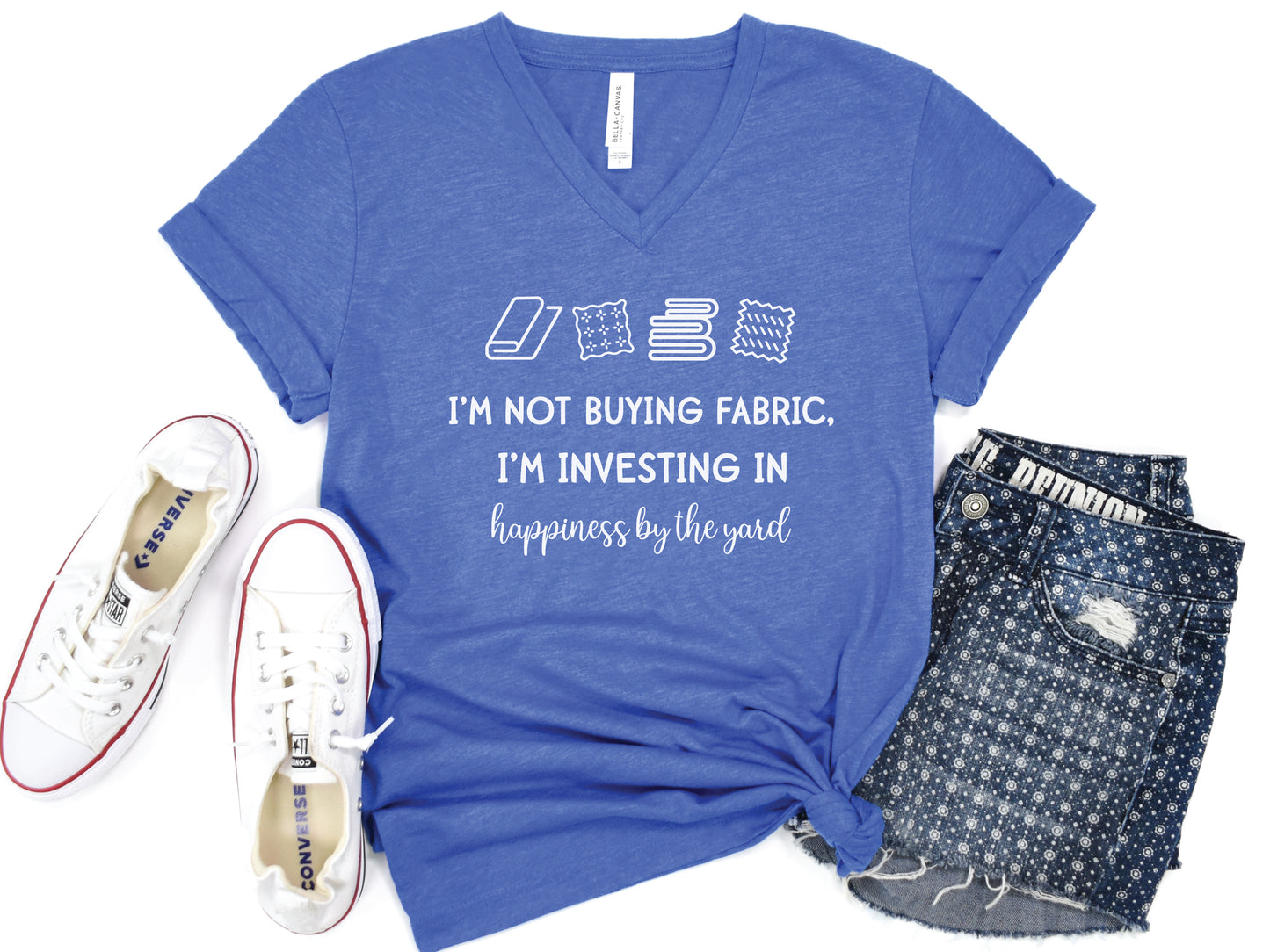 Sewing-themed V-neck t-shirt with the phrase “I’m Not Buying Fabric, I’m Investing in Happiness by the Yard,” perfect for sewists and fabric lovers.
