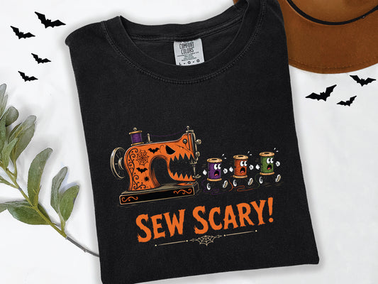Sew Scary Halloween t-shirt design with a vintage orange monster sewing machine chasing purple, orange, and green spools of thread, with bats and spiderwebs.