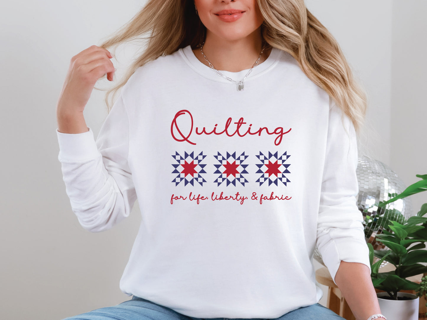 Patriotic long sleeve quilting t-shirt with “Quilting for Life, Liberty, & Fabric” phrase, perfect for quilters and summer sewing days.