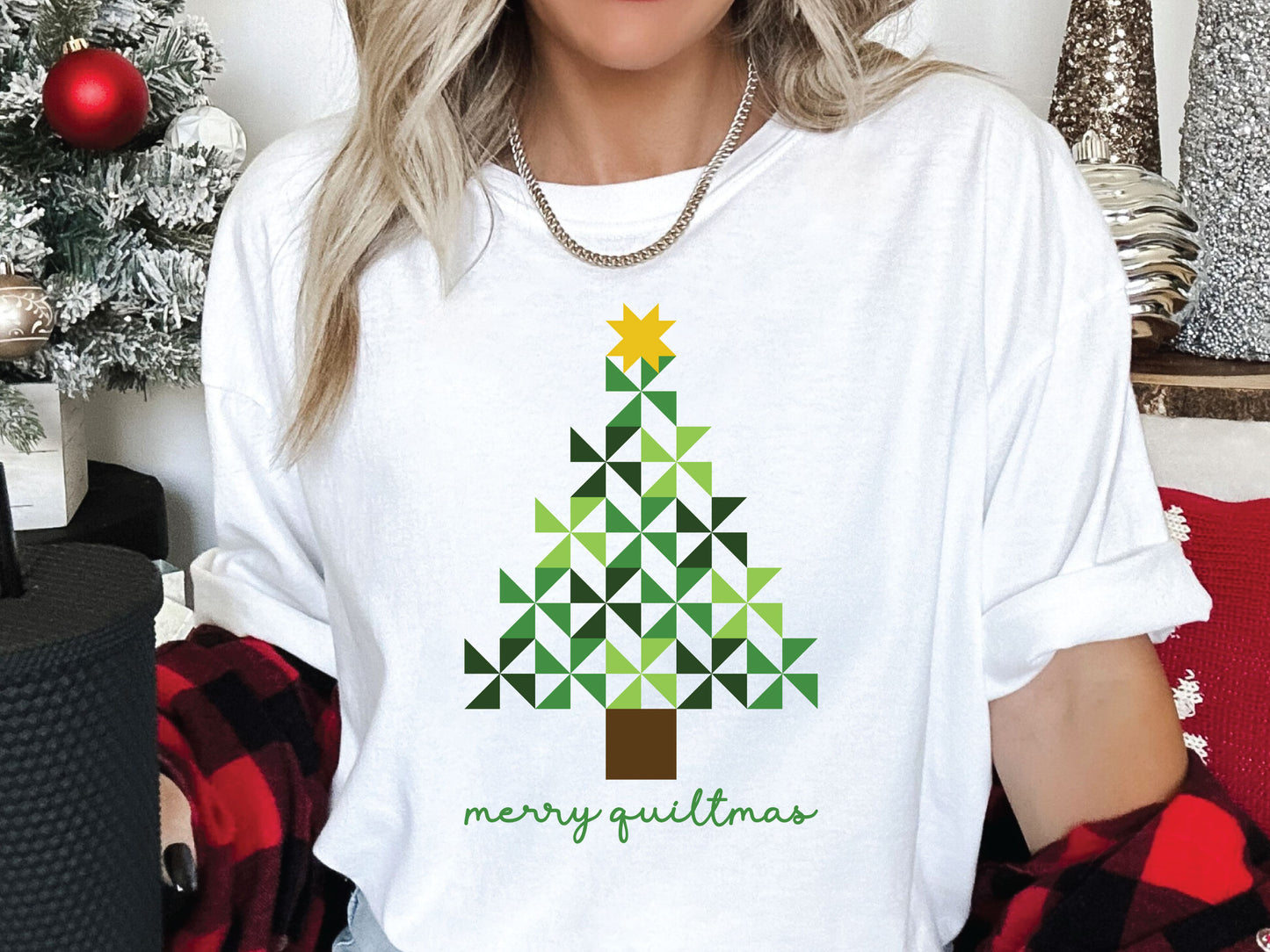 Merry Quiltmas t-shirt in White with quilt block Christmas tree design in green pinwheel blocks topped with gold star—holiday gift for quilters. Shop at Bee Inspired Tees for sewing and quilt-themed short and long sleeve t-shirts, gifts, and stickers designed for passionate sewists and quilters.