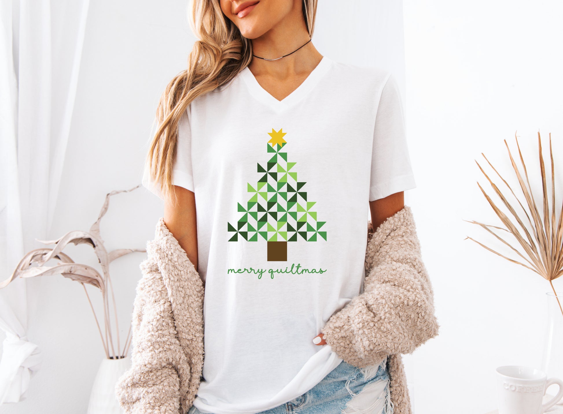 Quilting tee with a Merry Quiltmas design featuring a green pinwheel quilt-block Christmas tree topped with a gold star — festive holiday gift for quilters and sewists.