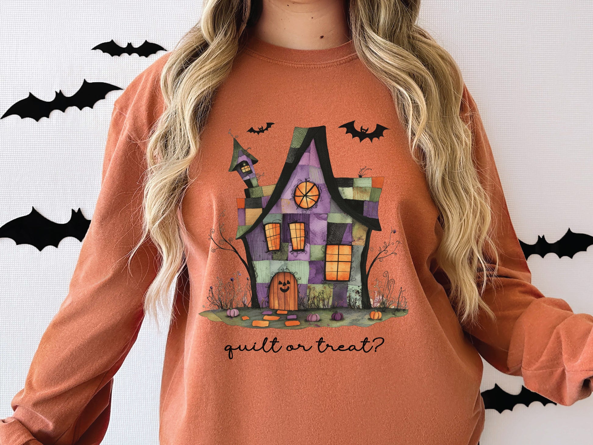 Quilt or Treat Halloween t-shirt on a Comfort Colors Yam tee—fun Halloween gift for quilters, perfect for spooky season sewing and retreats.
